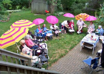 Winslow Gardens - Lounge Chairs and Umbrellas in the Outdoors