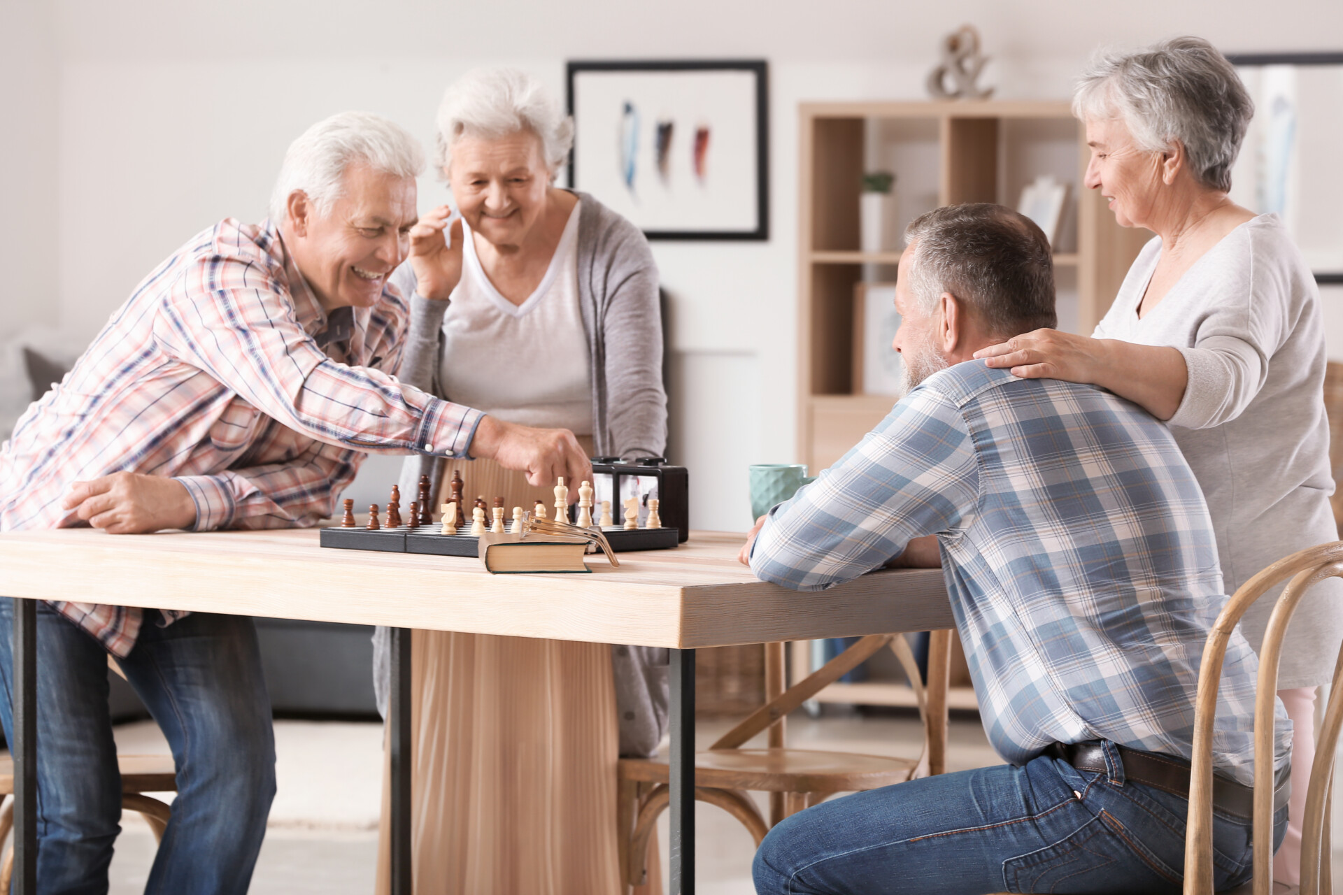 Elderly People Playing Chess In Nursing Home